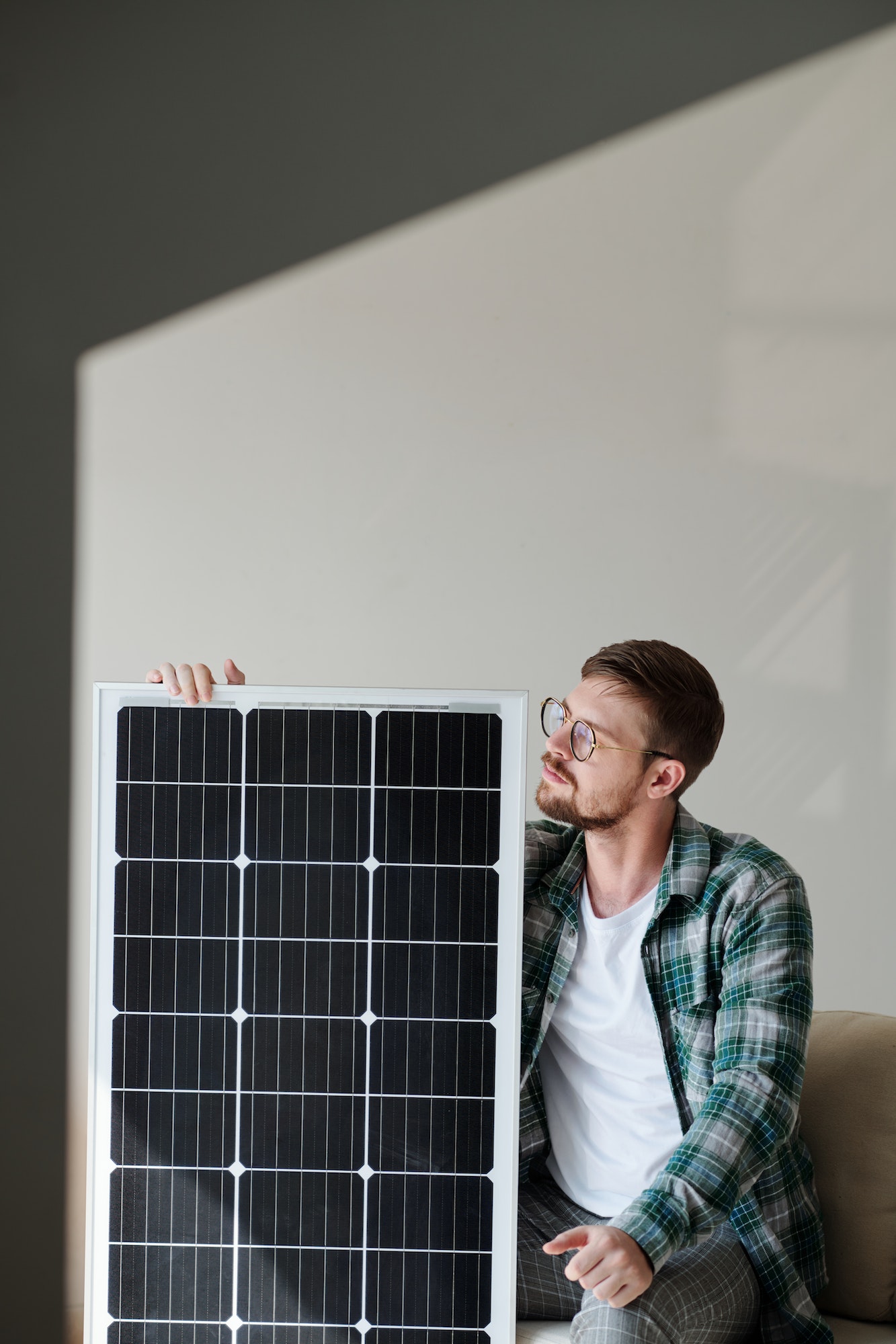 Excited Man with Solar Panel