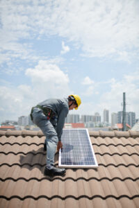 Builer Installing Solar Panel