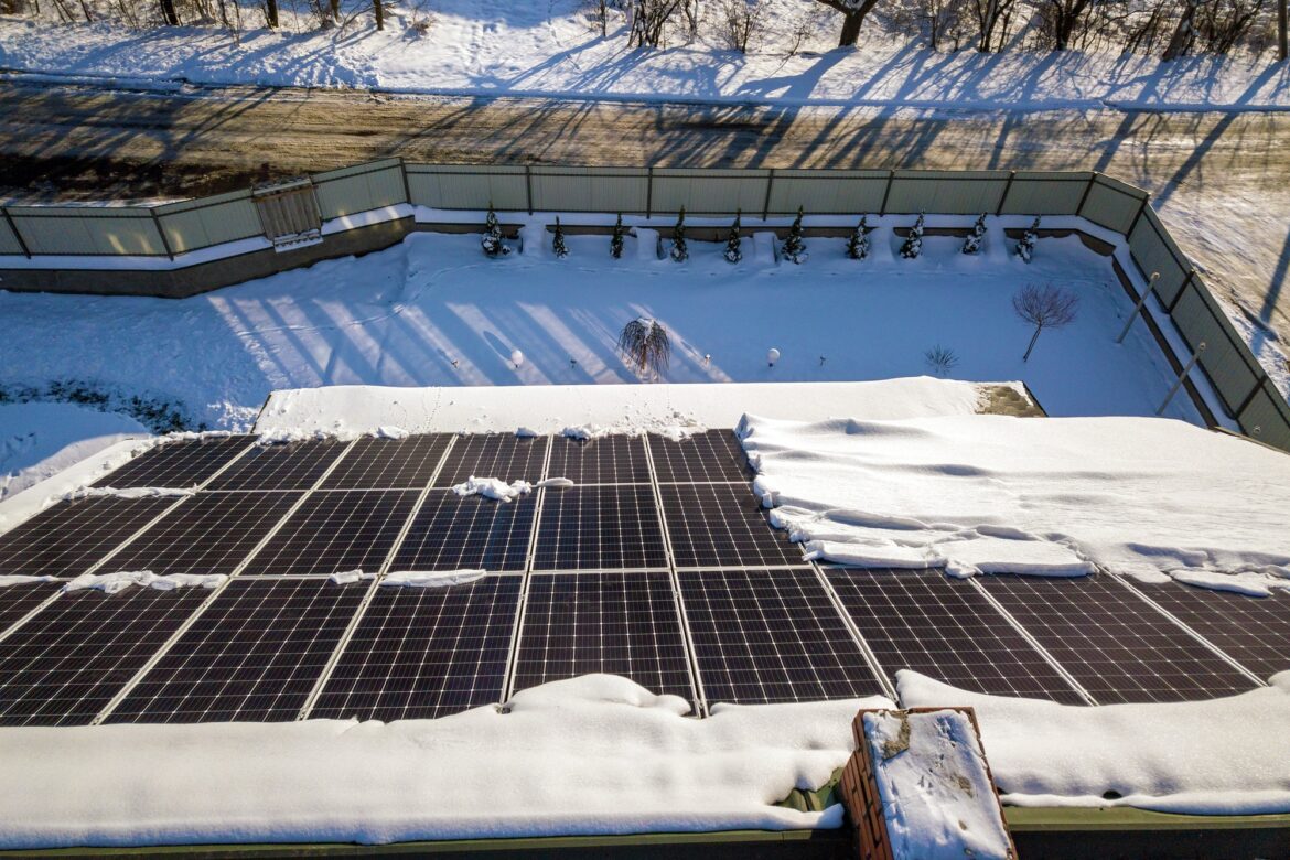 Close up surface of a house roof covered with solar panels