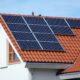 Roof top with solar panels for green energy.